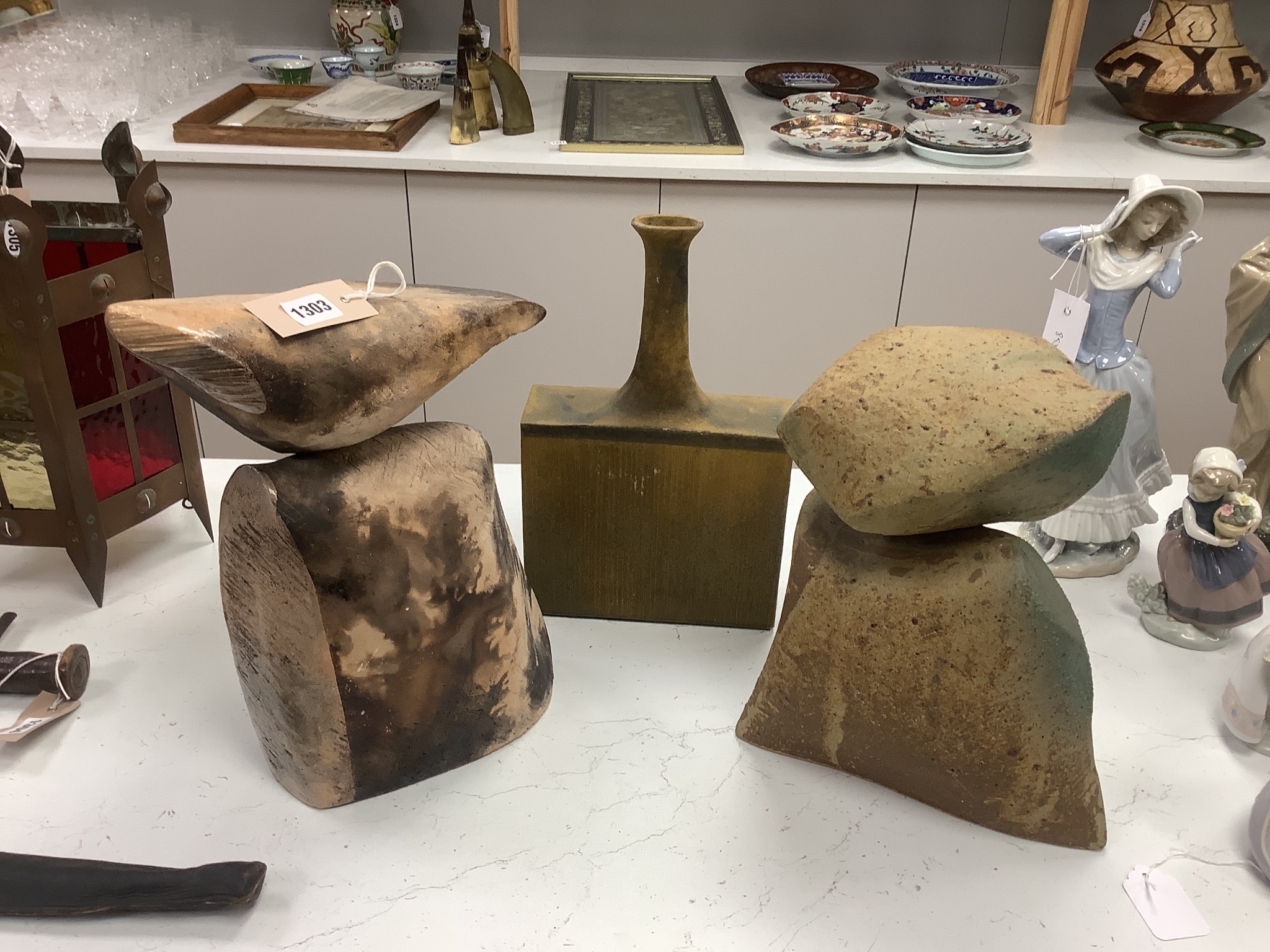 Two contemporary stoneware sculptures and a bottle vase, 35cm